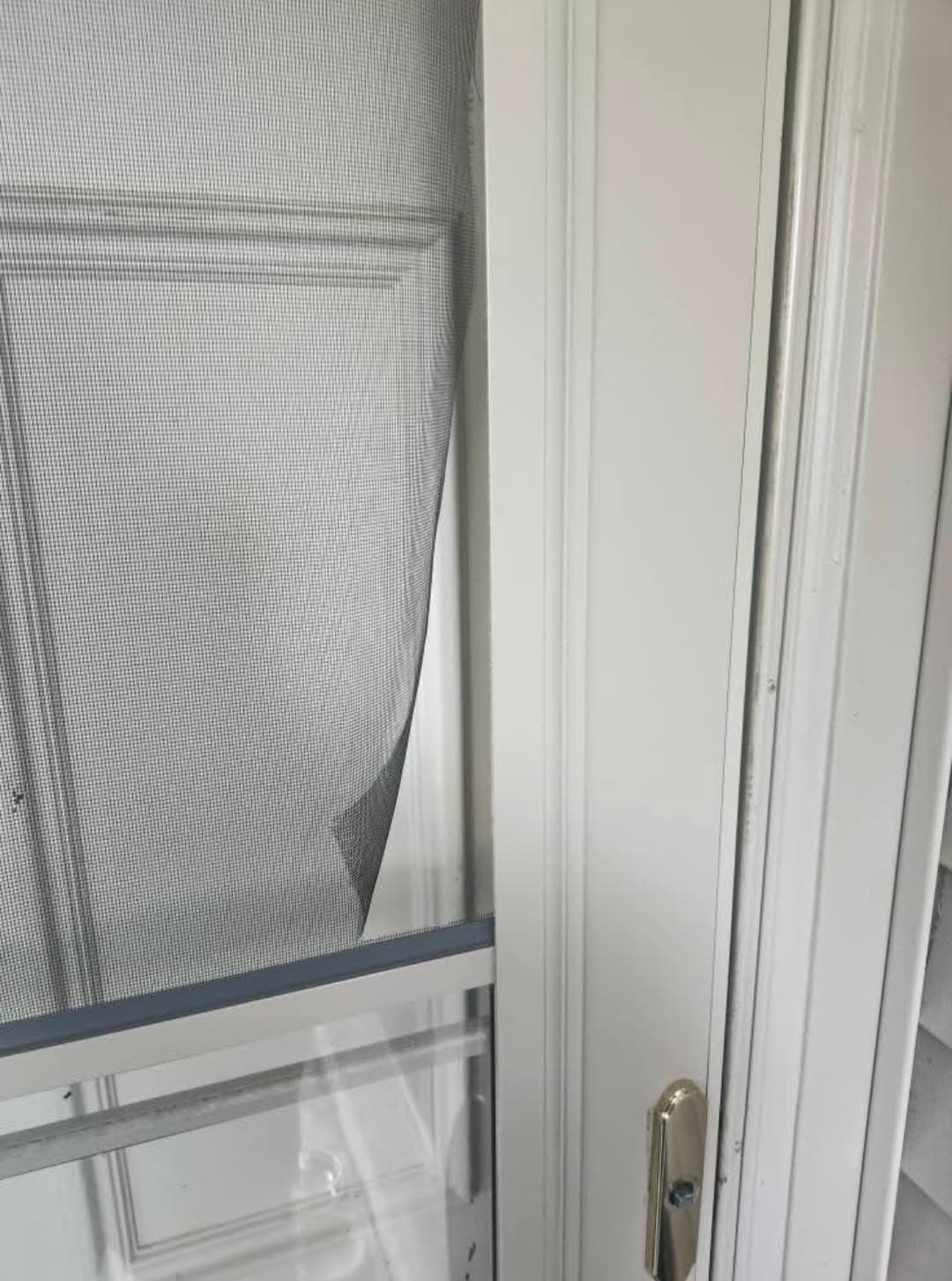 Fixing a Torn Screen of a Storm Door

Description of Issue