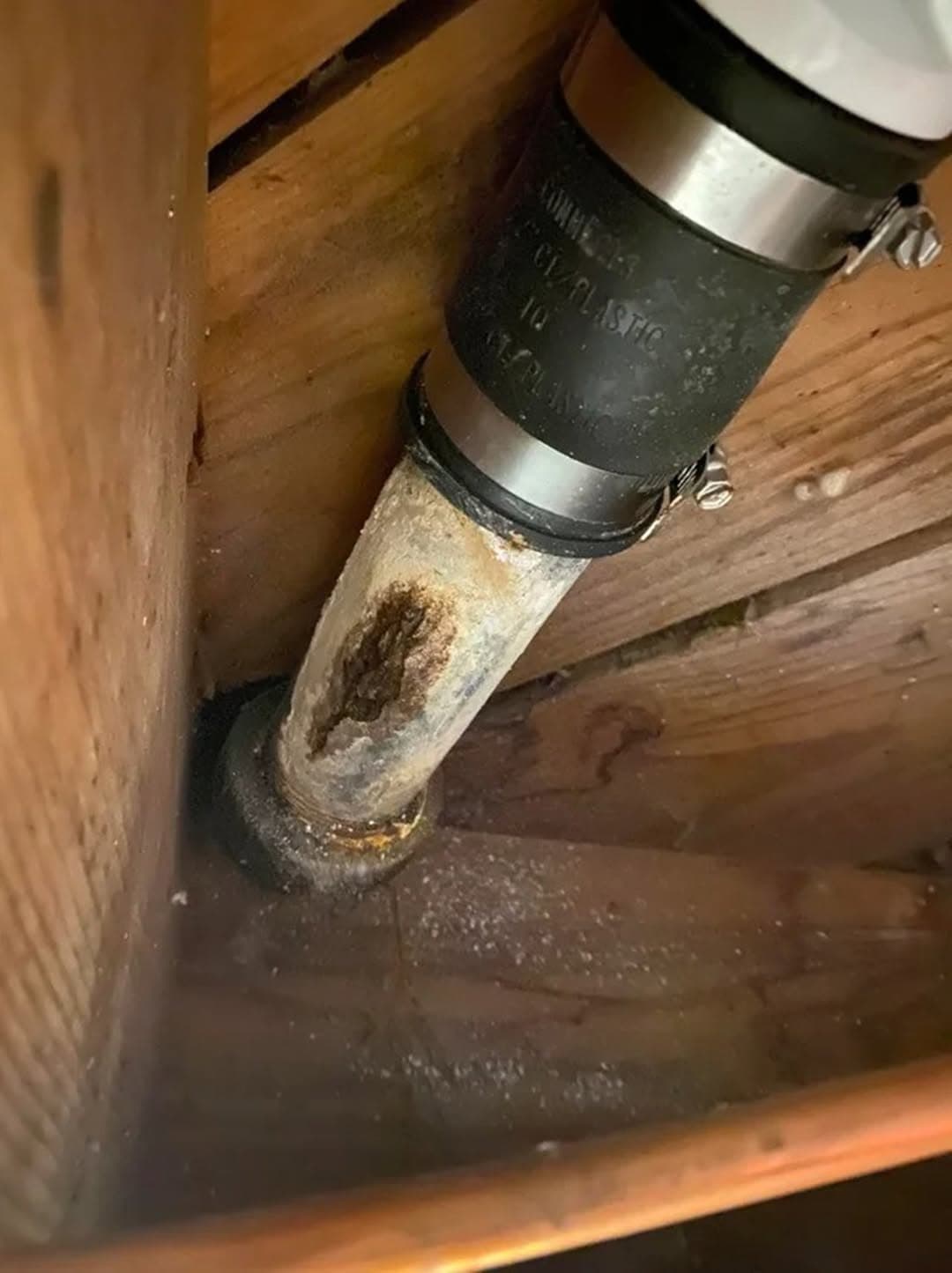 Fixing a Cracked Cast Iron Drain Pipe

Description of Issue